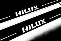Накладки на пороги с подсветкой для Toyota Hilux VIII (2015-н.д.)