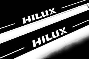 Накладки на пороги з підсвіткою для Toyota Hilux VIII (2015-н.д.)