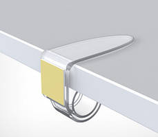 Пластиковий тримач-равлик COIL-T з клейовою основою