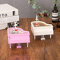 Музична скринька,рожевого  кольору "Пианино" з фігуркою, що танцює 16*15*9