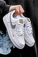 Женские кроссовки Nike Air Force 1 '07 Essential (серо-белые с золотистым) модные кроссы I1003 cross