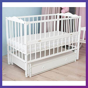 Дитяче ліжечко дерев'яне з бука Ангеліна маятник із шухлядою біле 3 рівні висоти