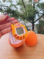 Іграшка електронний вихованець Тамагочі в Яйці Динозавра CG Eggshell Game колір жовтий