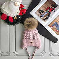 Дитяча зимова рожева шапка із зав'язками та натуральним бубоном.