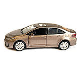 Машинка іграшкова металева Toyota Corolla Hybrid Автопром Тойота Королла гібрид, бронза, світло, звук, відкр. двері, 14*6*4 см, фото 3