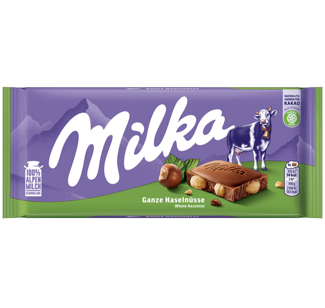 Milka Ganze Haselnüsse Молочний з цільним фундуком 100g