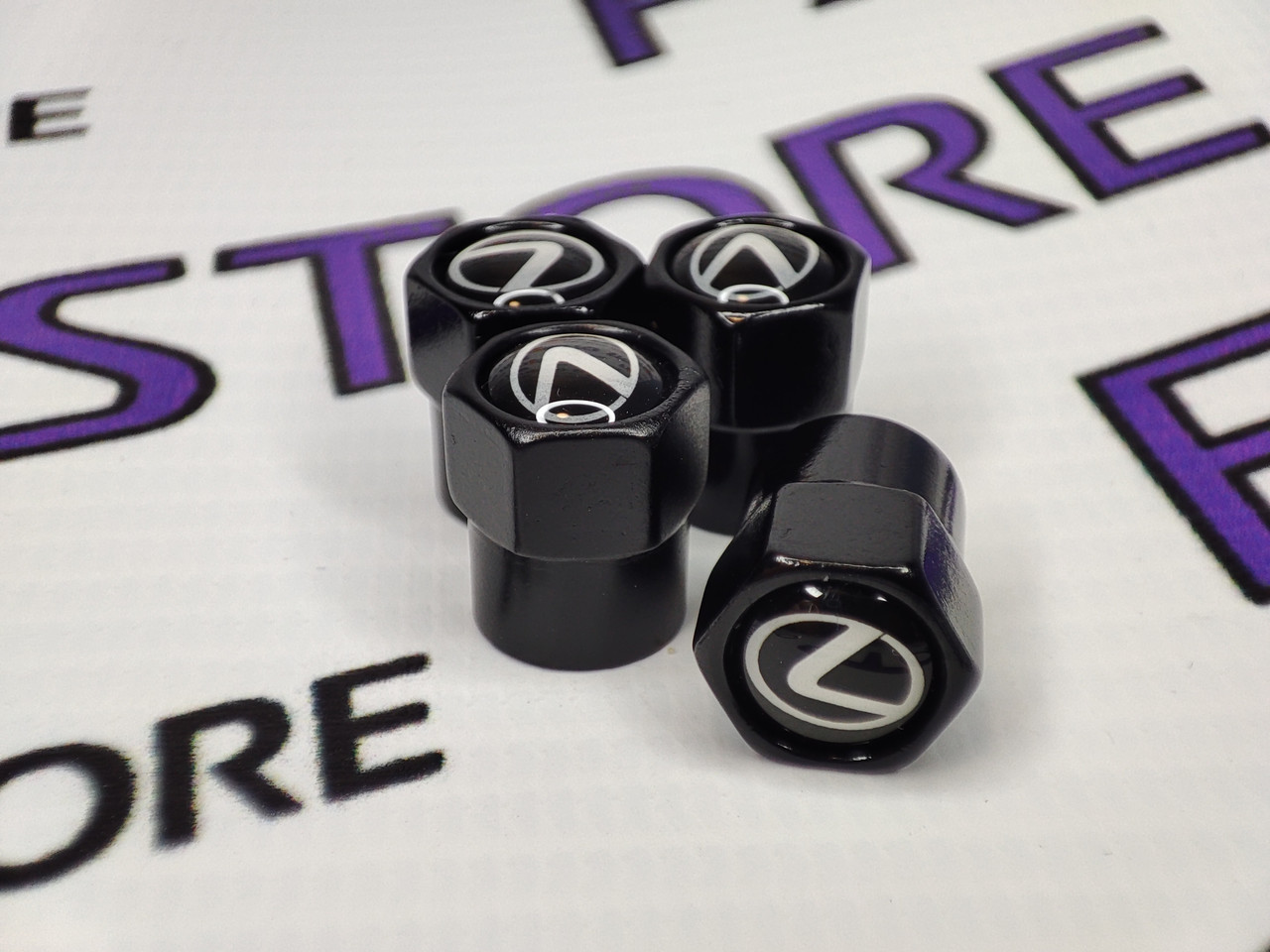 Захисні ковпачки на ніпелях LEXUS чорні шестигранні, 4 шт., фото 1