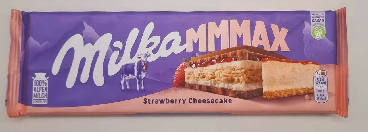 Молочный шоколад Milka Strawberry Cheesecake молочний з начинкою зі смаком чізкейку, полуничною начинкою 300г