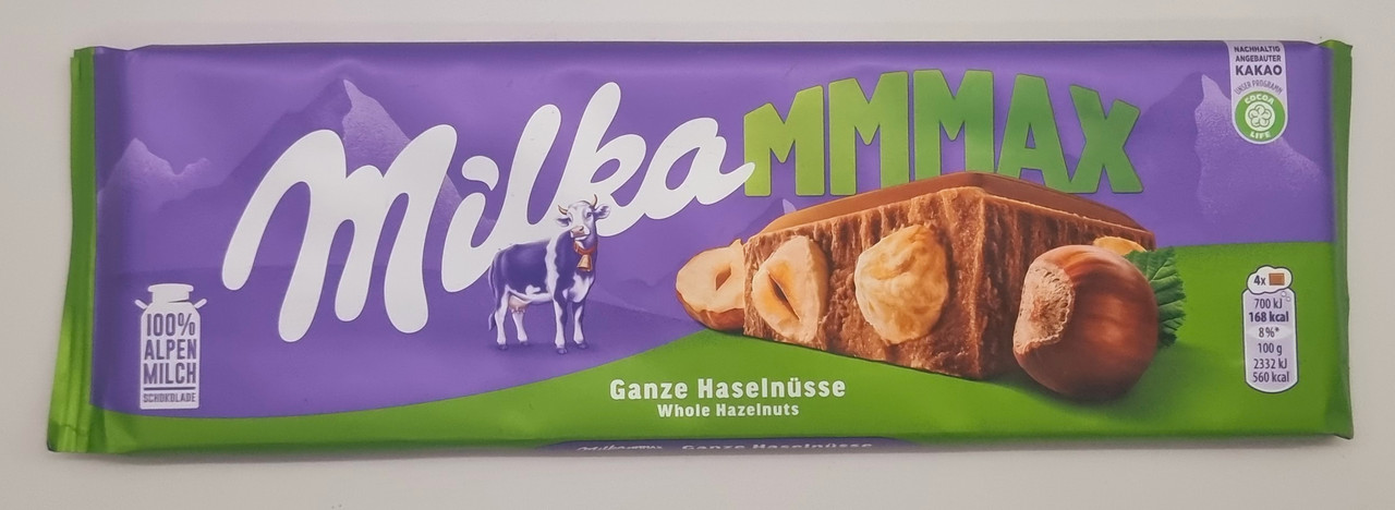 Молочний шоколад Milka Ganze Haselnüsse Цільний фундук 300г