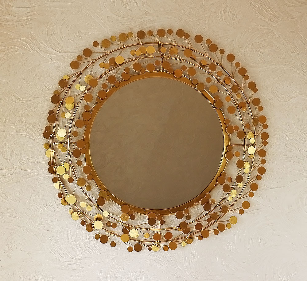 Декоративне дзеркало зі скла і металу в золоті