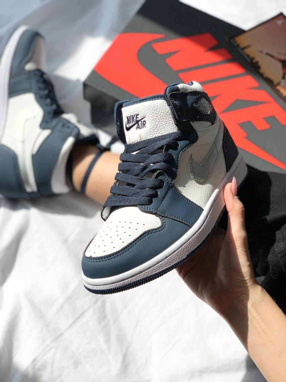 White and best sale navy blue jordans