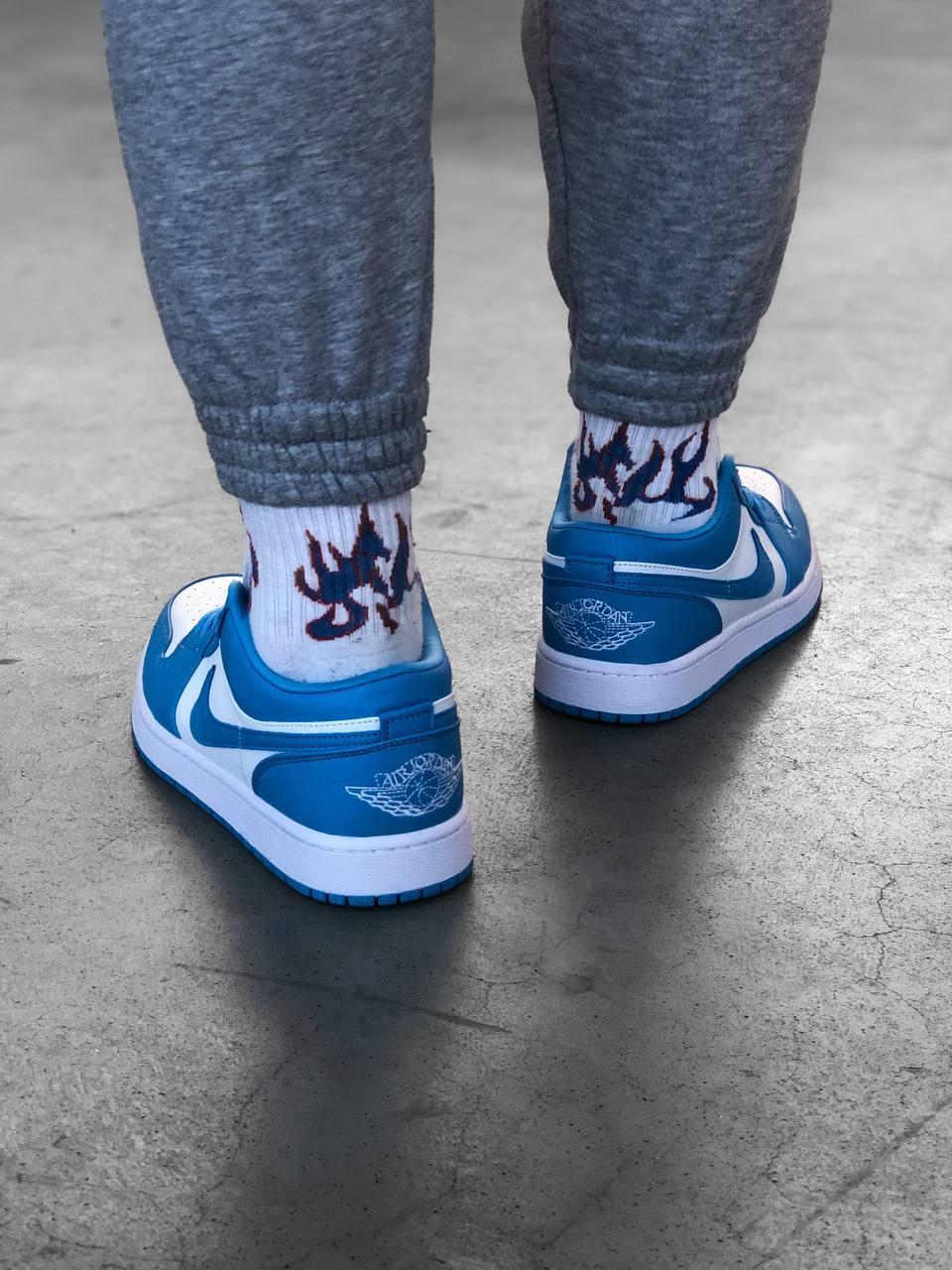 Blue and white hotsell low top jordans