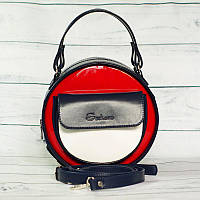 Жіноча, стильна кругла сумка від виробника, синя з червоними та білими вставками (код: IBG086