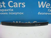 Накладка кришки багажника (панель підсвічування номера) на хетч (ДЕФЕКТ) Toyota Auris з 2006 по2009