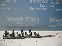 Вісь випускних клапанів з коромислами 2.0TDi (BMR) Volkswagen Passat B6 з 2005  по2008