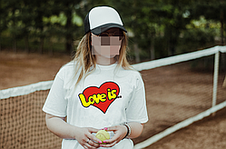 Жіноча футболка LOVE IS. / Біла жіноча футболка