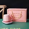 Чашка керамічна ніжно-рожева з підставкою - підігрівом та ложечкою в подарунковій упаковці, фото 6