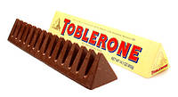 Шоколад Молочный Toblerone с Медом и Миндальной Нугой 100 г Швейцария (опт 10 шт)