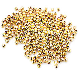 Намистини металеві круглі, розмір 2,4мм Ø 1мм, колір Золотистий, в уп. +-500шт.