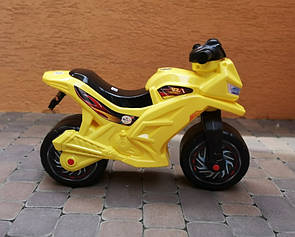 Жовтий біговел мотоцикл, толокар каталка для дітей із музикою