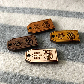 Бірка з логотипом 15х30х3мм