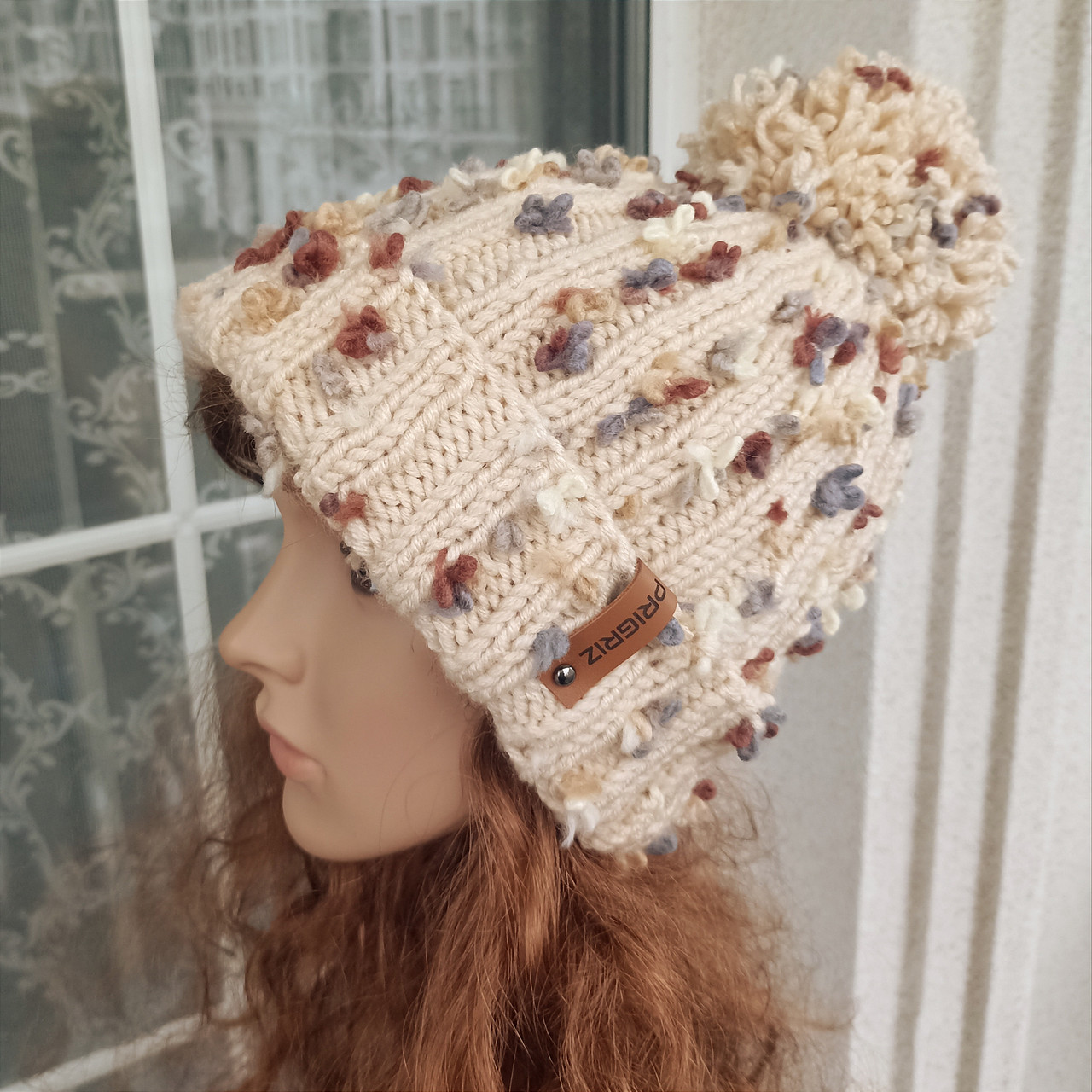 Жіноча шапка з помпоном та відворотом DeLux - HandMade made in PRIGRIZ