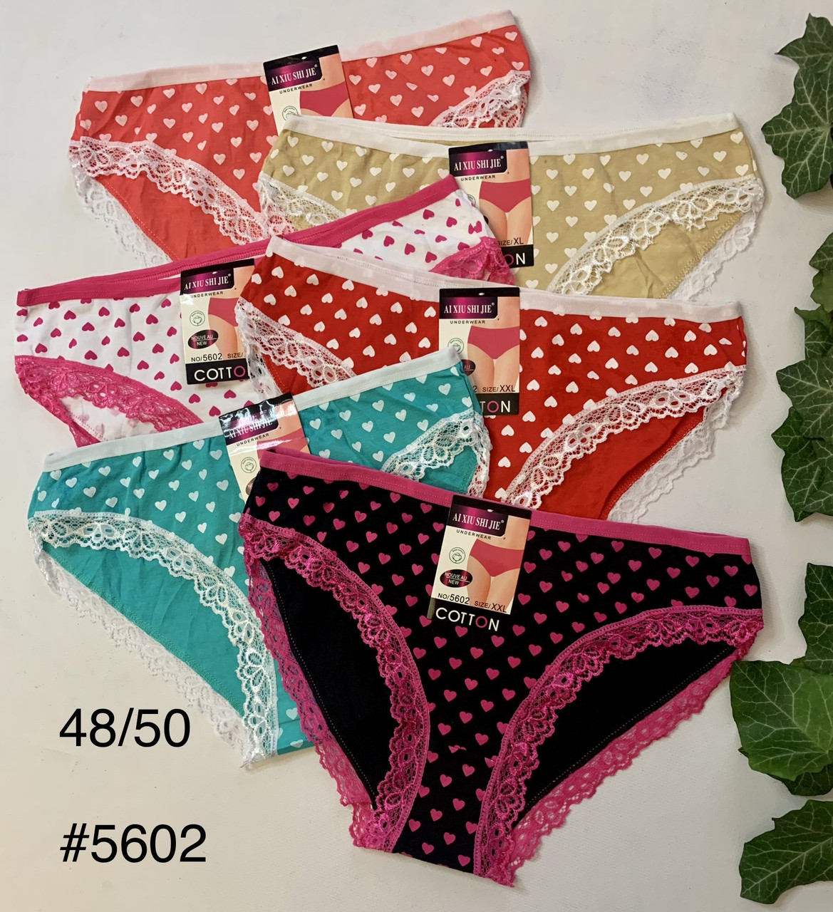 Труси в сердечках з мереживом по ножці