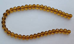 Бусина Куля з огранкою колір бурштиновий 8 мм