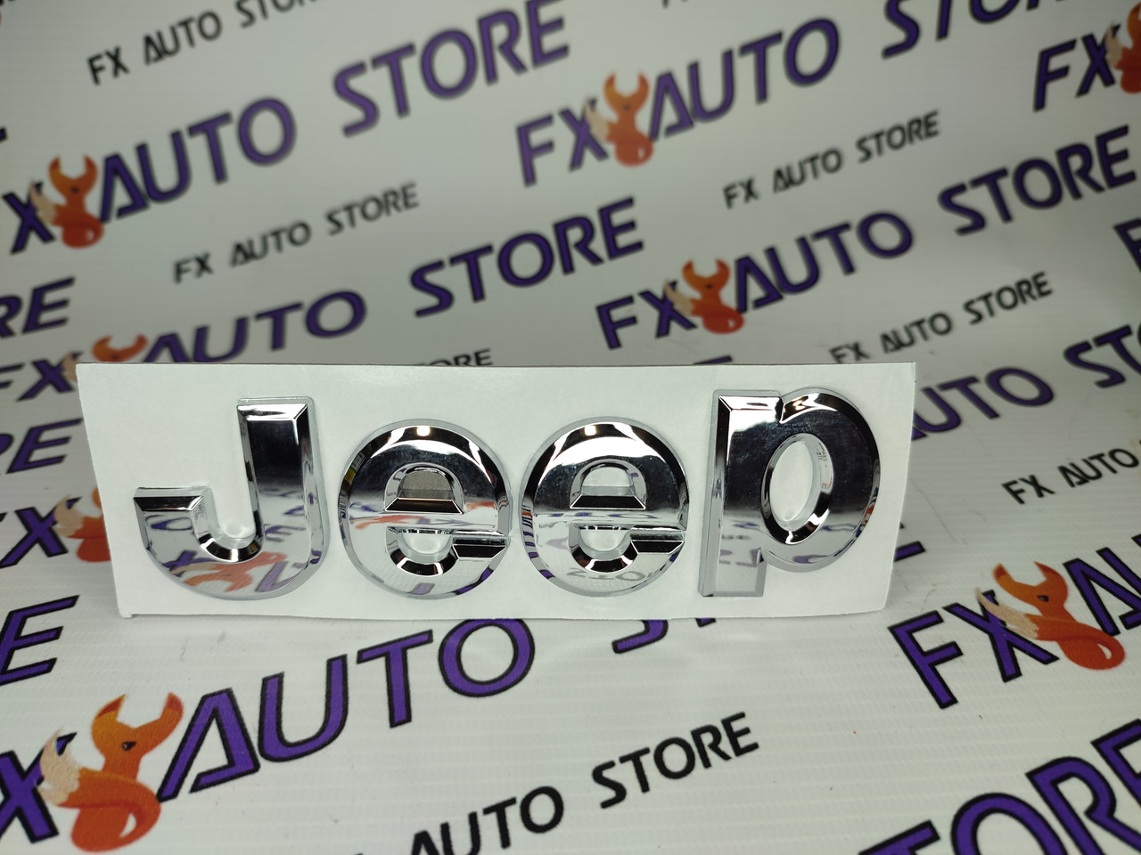 Емблема Jeep пластикова хромована на капот або кришку багажника, на двосторонньому скотчі