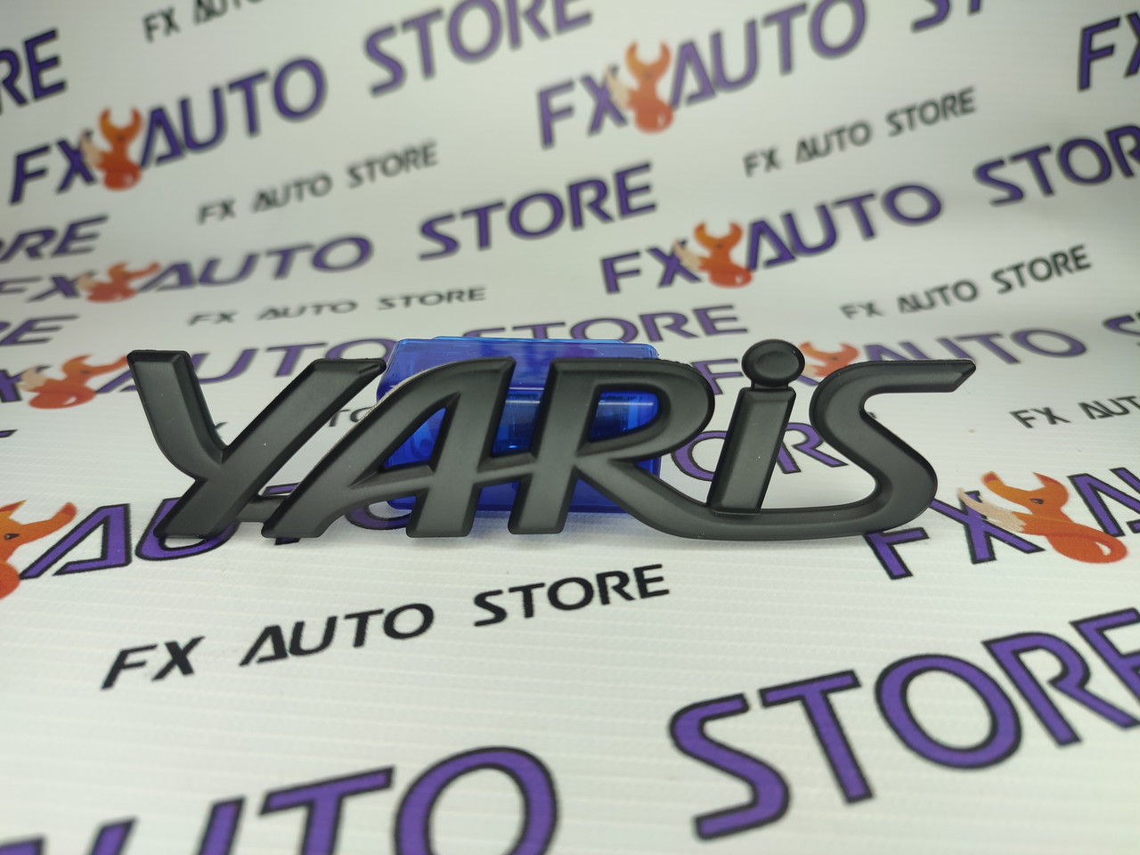 Емблема шильдик логотип YARIS 135 X 30 мм чорна матова для Toyota, фото 1