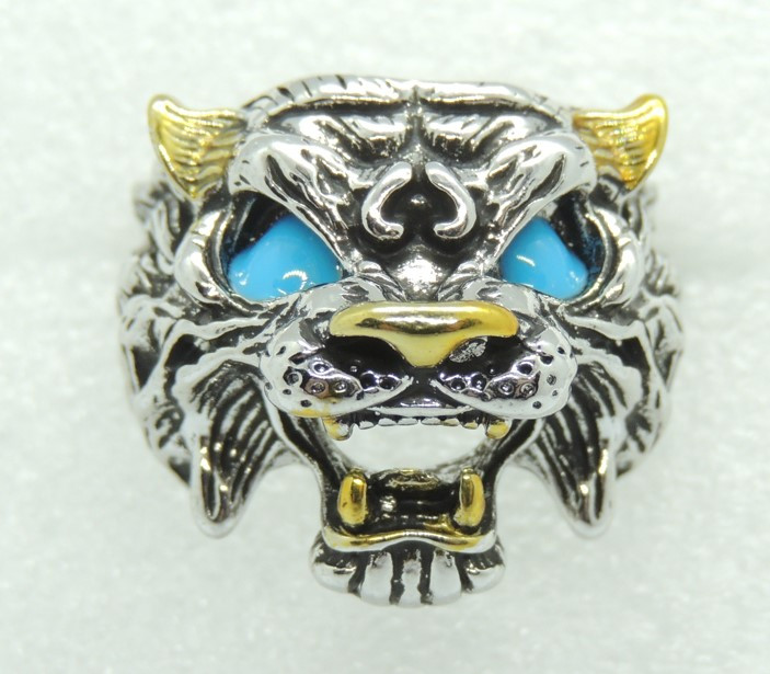 Чоловічий перстень у вигляді тигра з синіми яскравими очима ніс та вуха золотого кольору розмір регульований