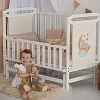 Кроватка для малыша с маятником Карина 2 слоновая кость