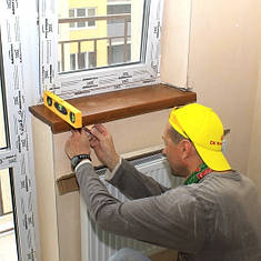 Установка дерев'яних підвіконь