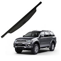 Задняя накладка (шторка, полка) багажника Mitsubishi Pajero Sport (08-15 г.в.)