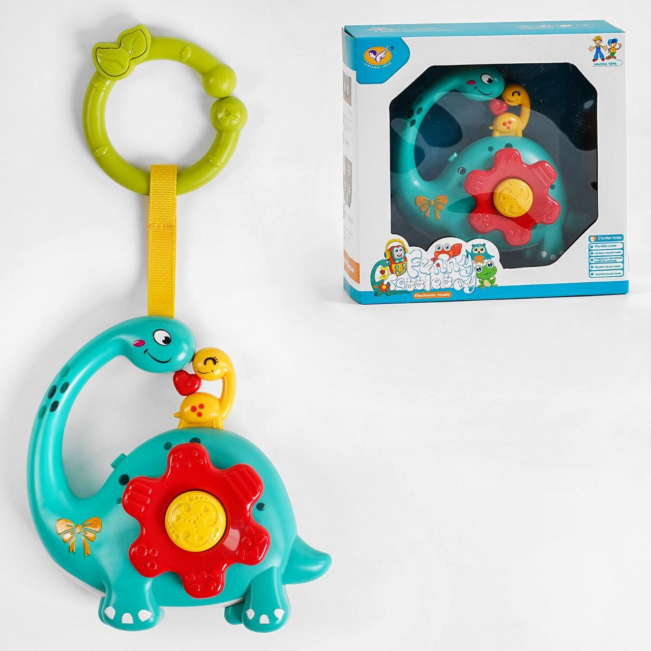 Брязкальце Динозавр, світло, звук, звуки тварин, на батарейках, у коробці 15 см × 6 см × 15 см