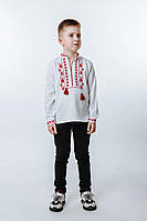 Стильна біла лляна дитяча вишиванка на хлопчика з червоним орнаментом, ошатна красива сорочка в школу