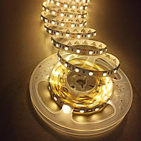 Світлодіодна стрічка тепла біла LED з клейкою основою 8мм 4,8W/м 60 LED/м IP20 ST-12-2835-60-WW-20-V2 Biom