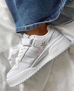Adidas forum triple white hotsell