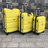 Дорожня валіза L ЖОВТА ПОЛІКАРБОНАТ Wings AT01 Дорожній чемодан на 4 кола Дорожная сумка с ручкой, фото 4