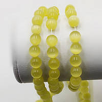 Бусини Котяче око діаметр 8 мм колір жовтий 50 шт.