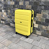 Дорожня валіза L ЖОВТА ПОЛІКАРБОНАТ Wings AT01 Дорожній чемодан на 4 кола Дорожная сумка с ручкой, фото 6