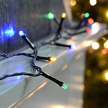 Новорічна гірлянда з яскравими різнокольоровими лампочками 9,5 метрів та чорним шнуром з вилкою для розетки топ
