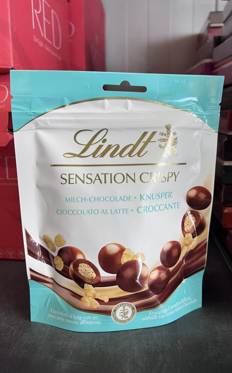 Шоколадні шарики Lindt Sensation Crispy Milch 140 гр. Швейцарія