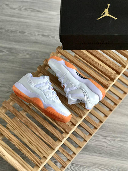 Jordan 11 low deals white and orange