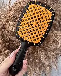 Гребінець для волосся "Super Brush". Оранжевий з чорною ручкою, у пакеті