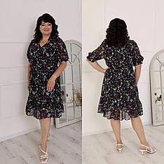 Жіноча повсякденна шифонова сукня з коротким рукавом чорного кольору з квітковим принтом. Розміри 54-60