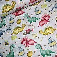 Хлопковая ткань польская разноцветные динозавры на белом (0476)