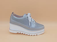 Літні шкіряні туфлі на танкетці. Снікерси. Erisses. Маленькі розміри (33, 34).