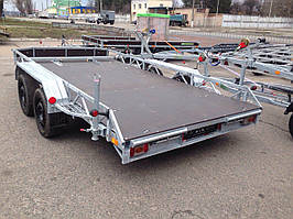 Причіп для перевезення багі та квадроциклів.4.0 м х 1,95 м. Без гальм.