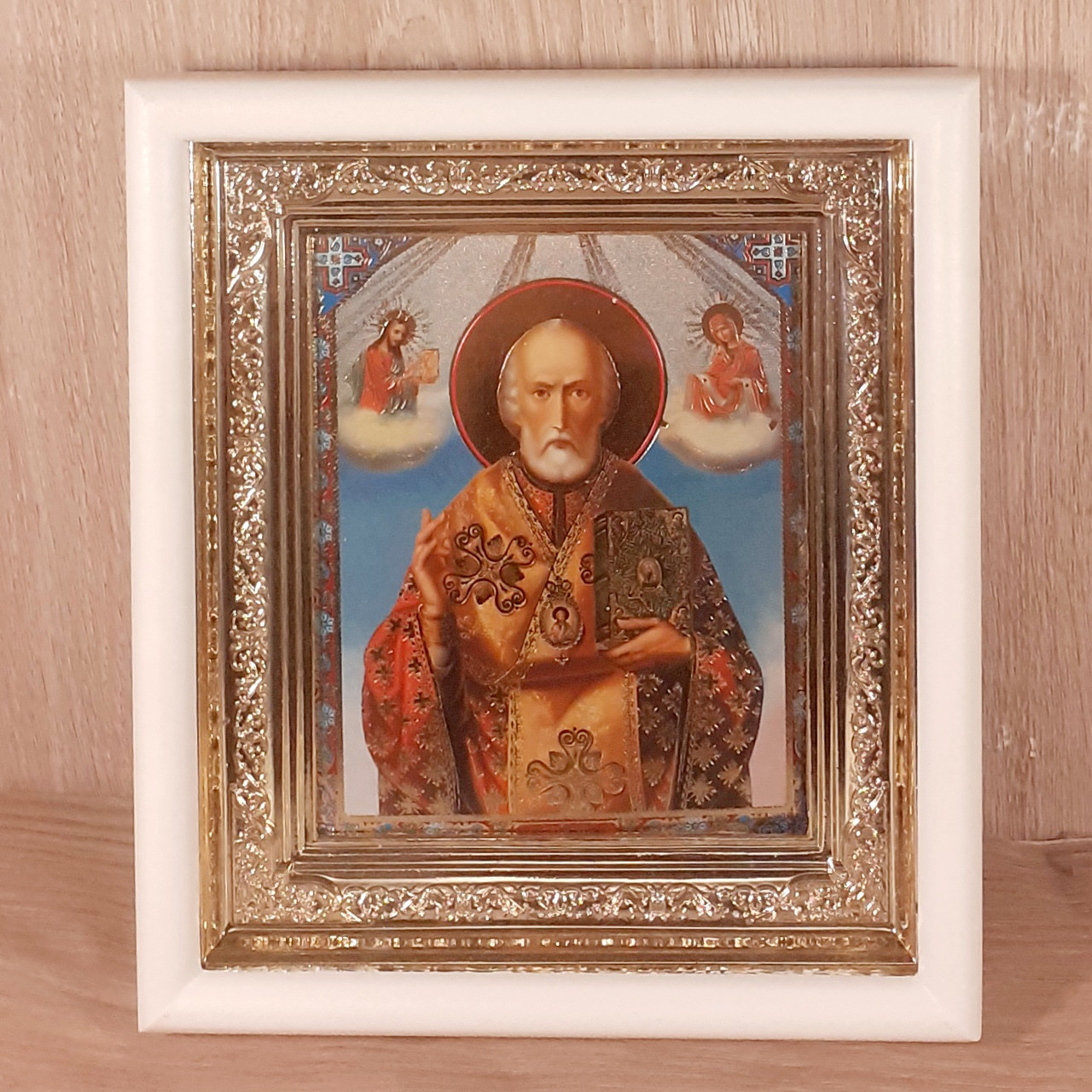 Ікона Миколай Чудотворець святий, лик 10х12 см, у білому прямому дерев'яному кіоті